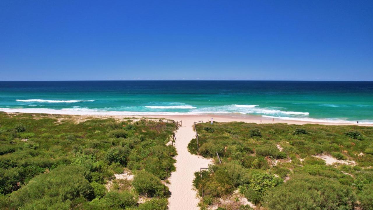 Pullman Magenta Shores Resort Entrance Eksteriør billede View of the beach from the lighthouse